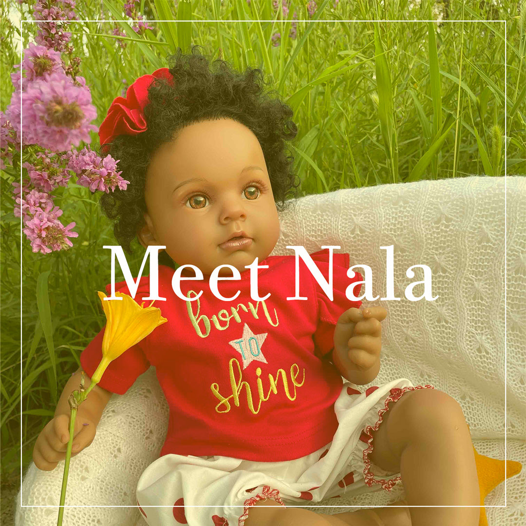 Nala is one of the Kaydora lifelike baby dolls. She wears a set of red T-shirt, a white pants, and a red flower hairband. She is so realistic that when I hug her outside, people thought she was a real baby girl.